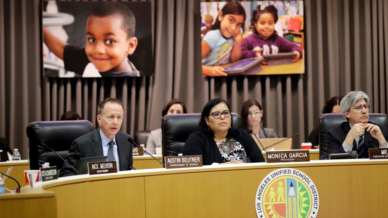 Los Angeles Unified School District Superintendent Austin Beutner, left, president Monica Garcia, center, and executive officer Jefferson Crain listen to testimony from attendees at the school board headquarters, Tuesday, Jan. 29, 2019, in Los Angeles. The Los Angeles Unified School District Board of Education unanimously ratified a contract with teachers that ended a strike while also approving a resolution asking the state to put new charter schools on hold while the state studies their effects. (AP Photo/Marcio Jose Sanchez)