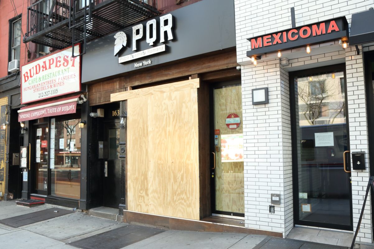 MANHASSET, NEW YORK - JUNE 7, 2020: Prada Store Boards Up As A