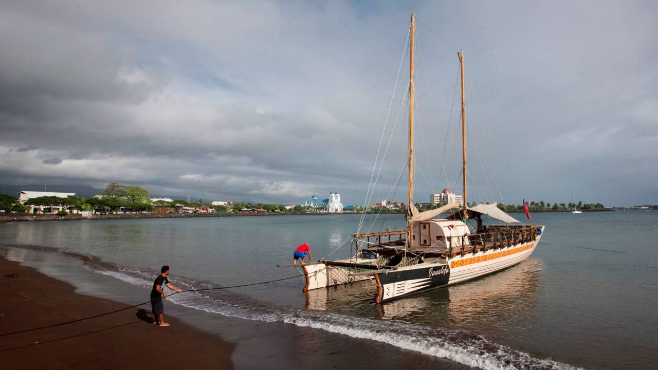 Traditional boat is located in Apia, Samoa, July 22, 2015. Samoa will go into lockdown from Saturday, March 19, 2022 as it faces its first outbreak of the coronavirus after a woman who was about to leave the country tested positive. (Dean Purcell/New Zealand Herald via AP)