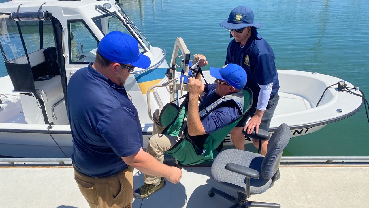The lift is located at the public Marina Park dock in Newport Beach, which has wheelchair access and handicapped parking (Spectrum News/William D'Urso)
