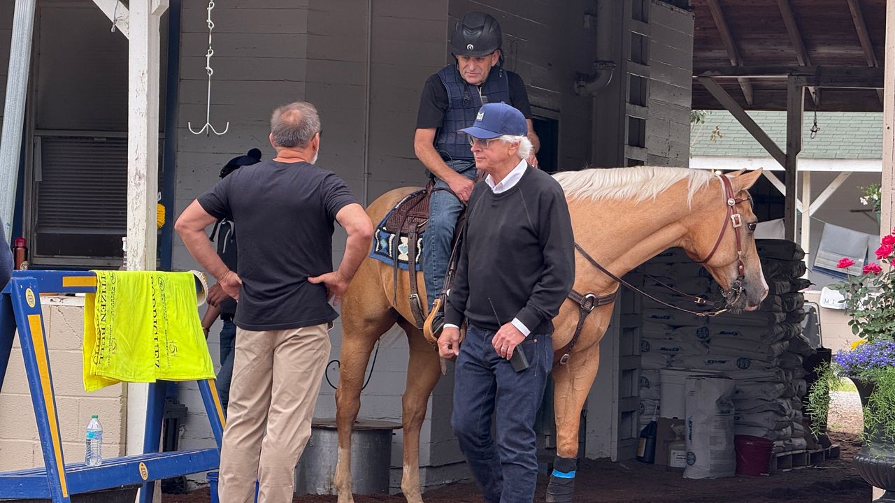 Bob Baffert's career success is posted outside barn 33 at Churchill Downs (Spectrum News 1/Lachlan McLean)
