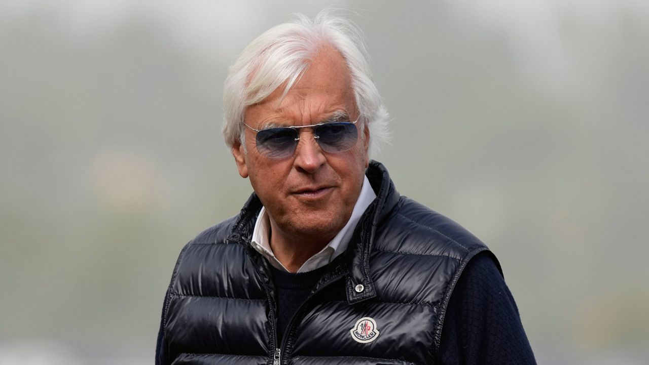 Bob Baffert has sued the historic track and is seeking a temporary injunction to stop his suspension following a failed drug test by the now-deceased Medina Spirit after the colt came in first in the 2021 Kentucky Derby. (AP Photo/Jae C. Hong)