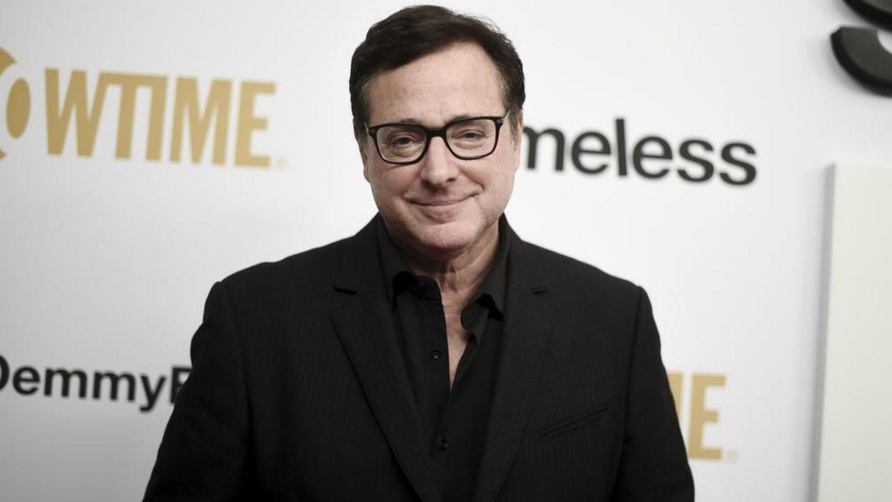 Bob Saget attends the "Shameless" FYC event at Linwood Dunn Theater on Wednesday, March 6, 2019, in Los Angeles. Saget, a comedian and actor known for his role as a widower raising a trio of daughters in the sitcom â  Full House,â   has died, according to authorities in Florida, Sunday, Jan. 9, 2022. He was 65. (Photo by Richard Shotwell/Invision/AP, File)