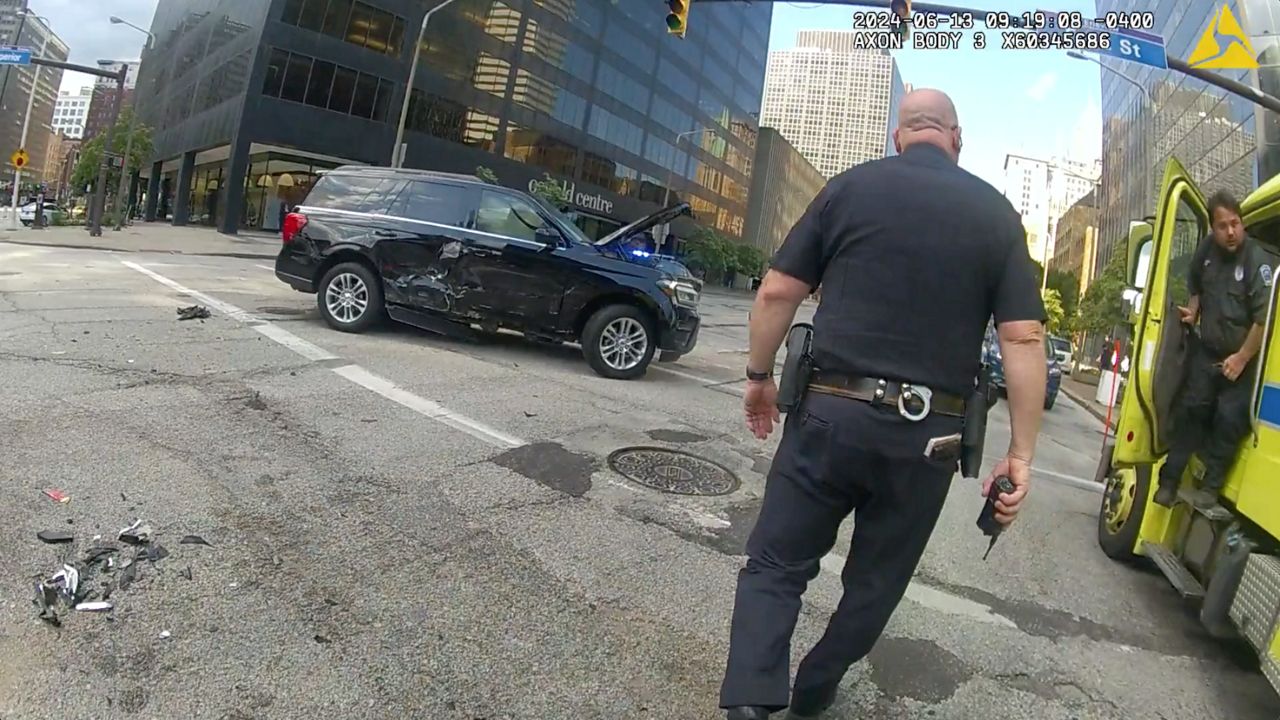 Police arrive at the scene of the accident involving Mayor Justin Bibb on June 13.