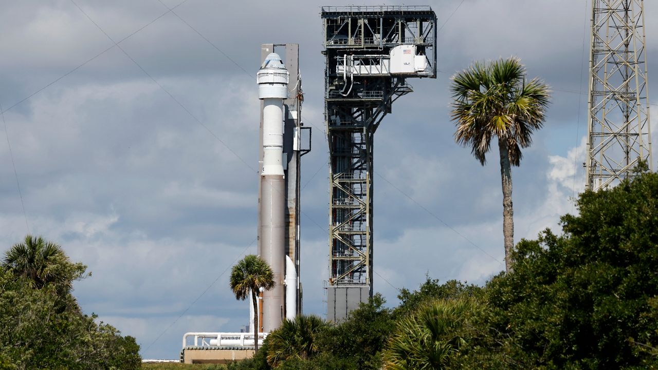 The Starliner space craft is seen sitting on top of the Atlas V rocket. A series of issues have plagued the maiden launch of the crewed Starliner mission. (File Photo)