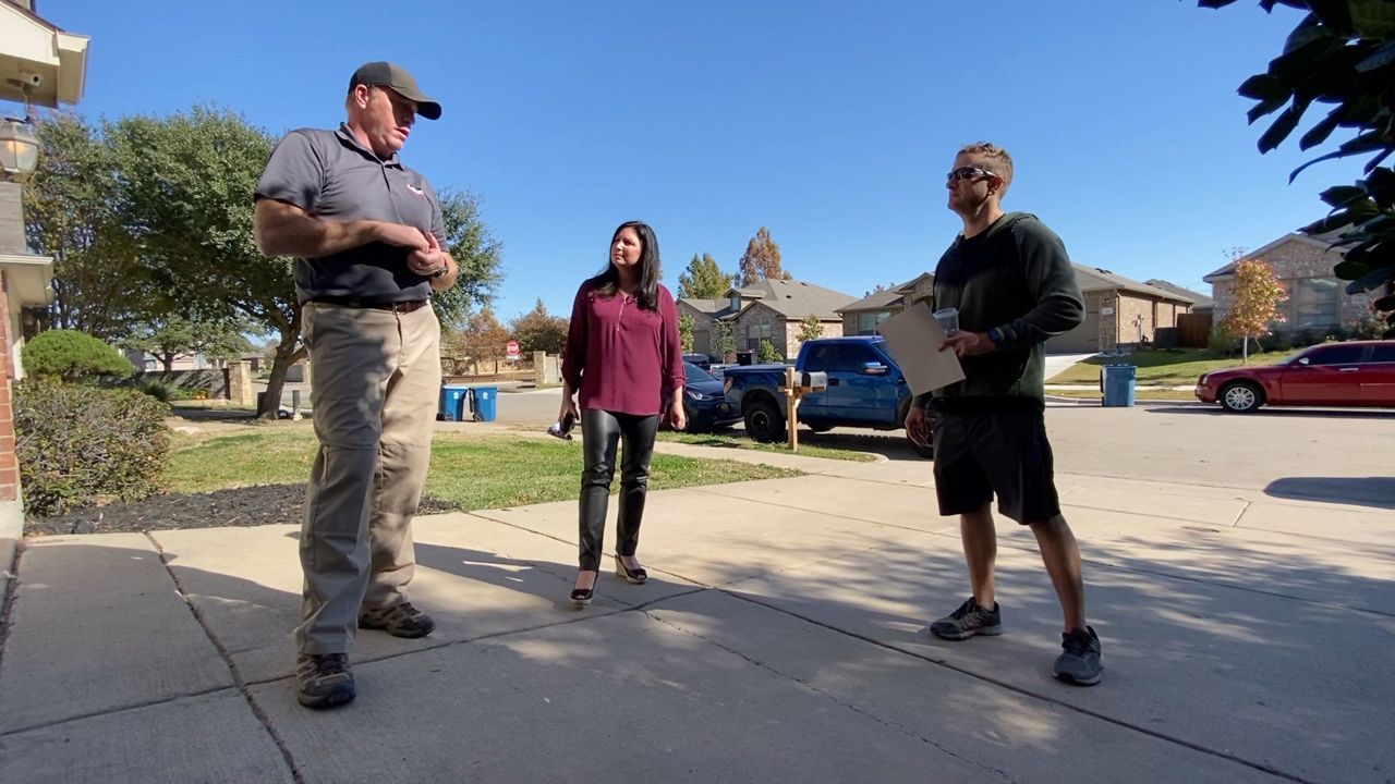 Realtor Julie Bologna with EXP Realty during a home inspection of one of her listings. (Lupe Zapata/Spectrum News 1)