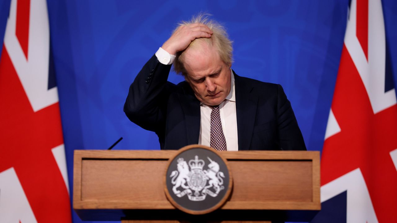 Britain's Prime Minister Boris Johnson speaks during a press conference in London, Saturday Nov. 27, 2021, after cases of the new COVID-19 variant were confirmed in the UK. (Hollie Adams/Pool via AP)