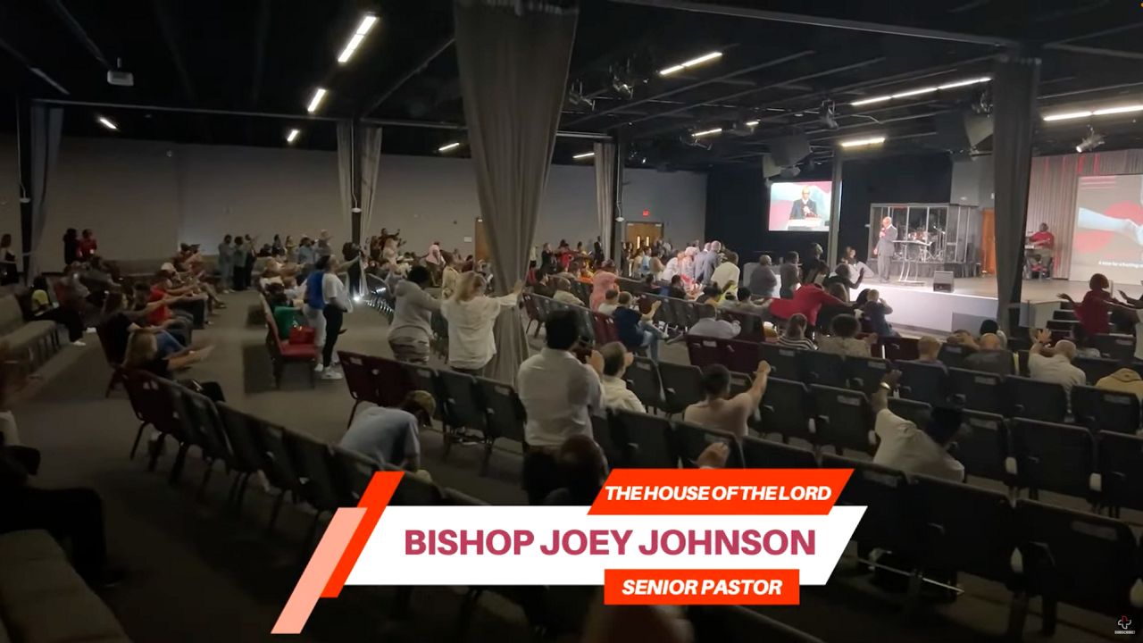 Senior Pastor Joey Bishop ofn the House of the Lord addresses a gathering at the Remedy Church in Akron. 