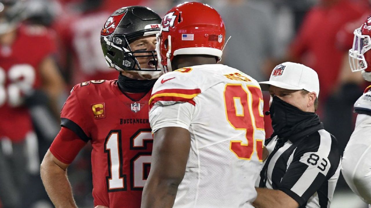 Tampa Bay quarterback Tom Brady (12) exchanges words with Kansas City Chiefs defensive tackle Chris Jones (95) during the second half of the Buccaneers' 27-24 loss to the defending Super Bowl champions.  (AP Photo/Jason Behnken)