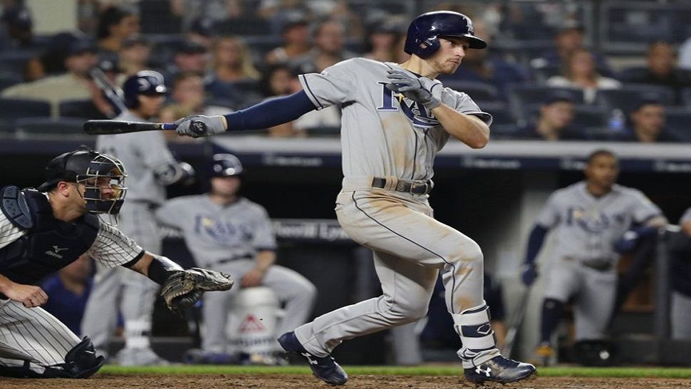 Tampa Bay Rays’ Brandon Lowe watches his RBI single during the fifth inning of a baseball game against the New York Yankees on Wednesday, Aug. 15, 2018, in New York. (AP Photo/Frank Franklin II)