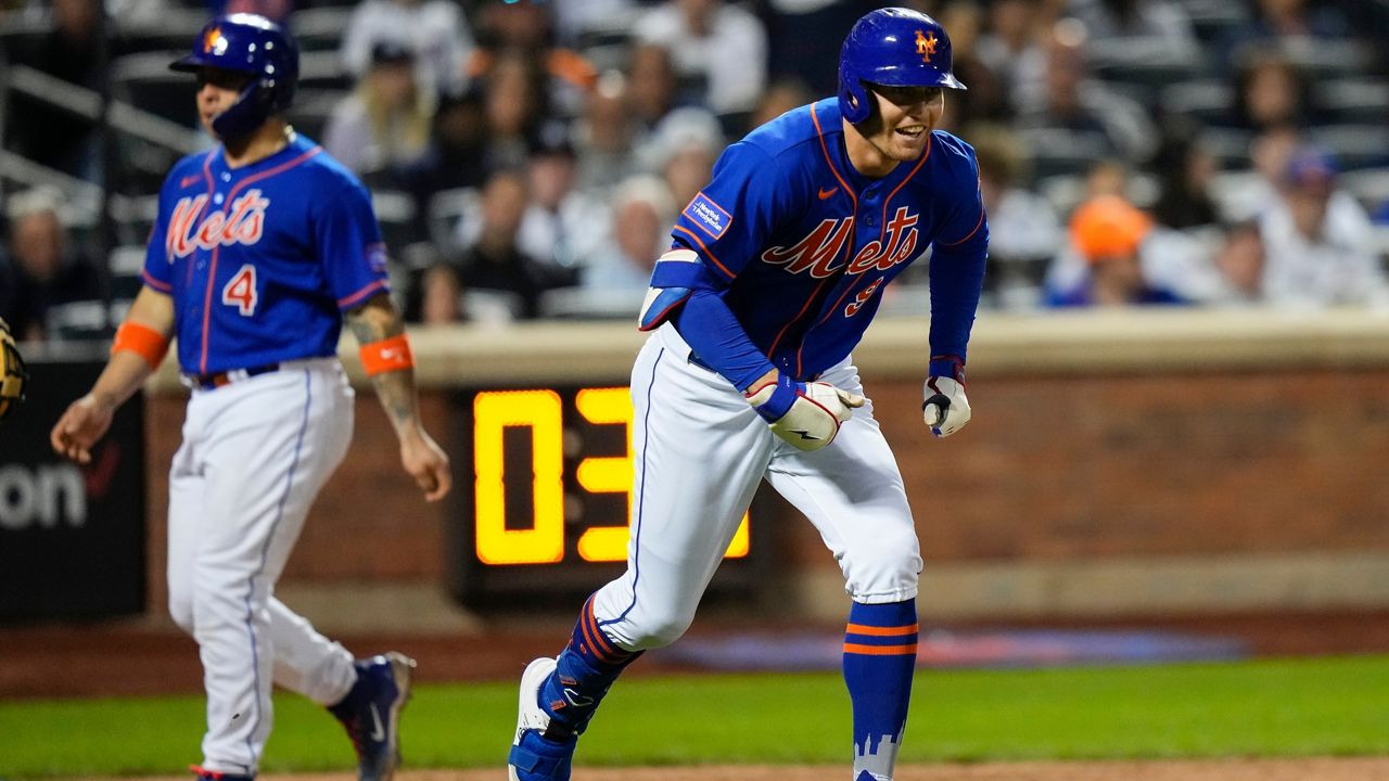 Mets rally to beat Athletics 4-3 in 10 innings