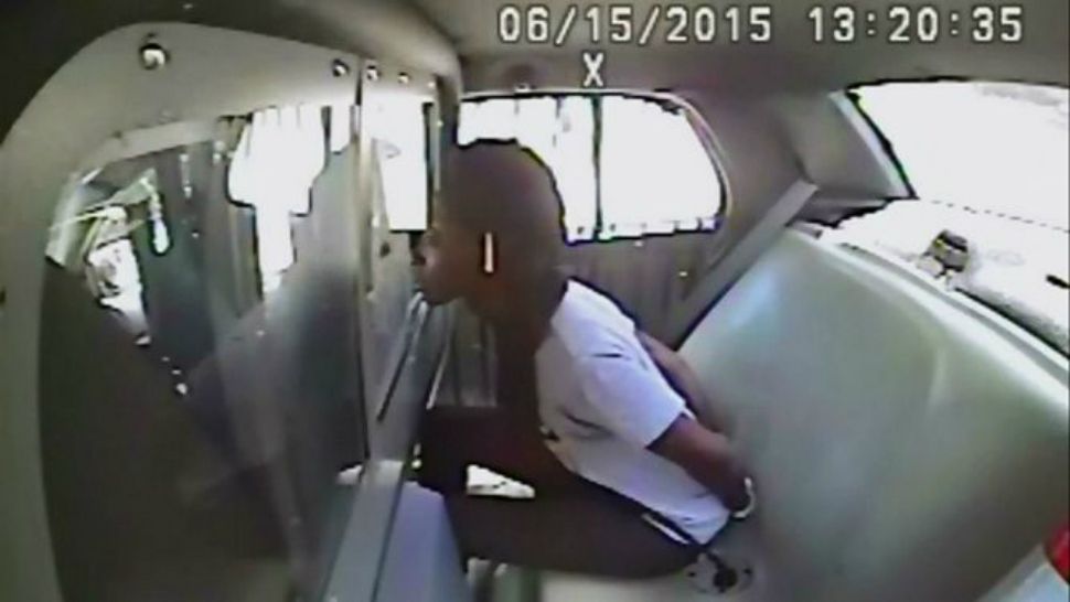 Breaion King appears in the back of an Austin Police Department patrol car in this video still from 2015. (Spectrum News/FILE)