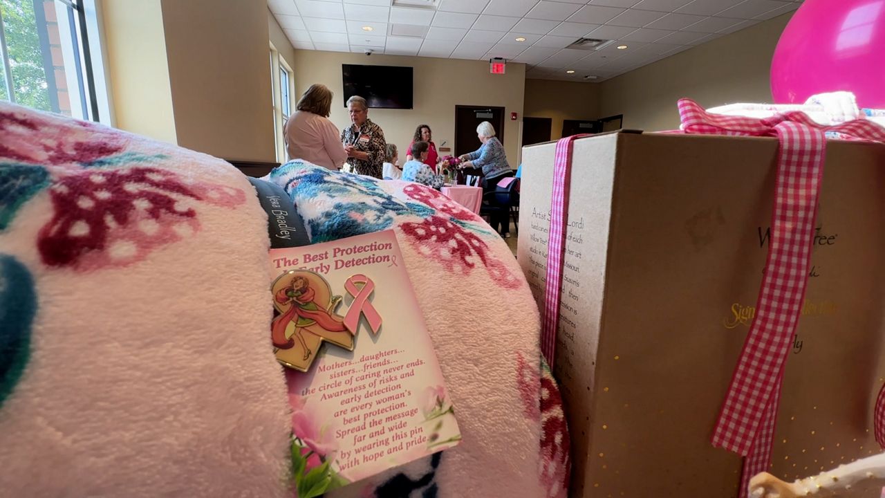 Shoppers donate 12 large boxes of bras to breast cancer care charity