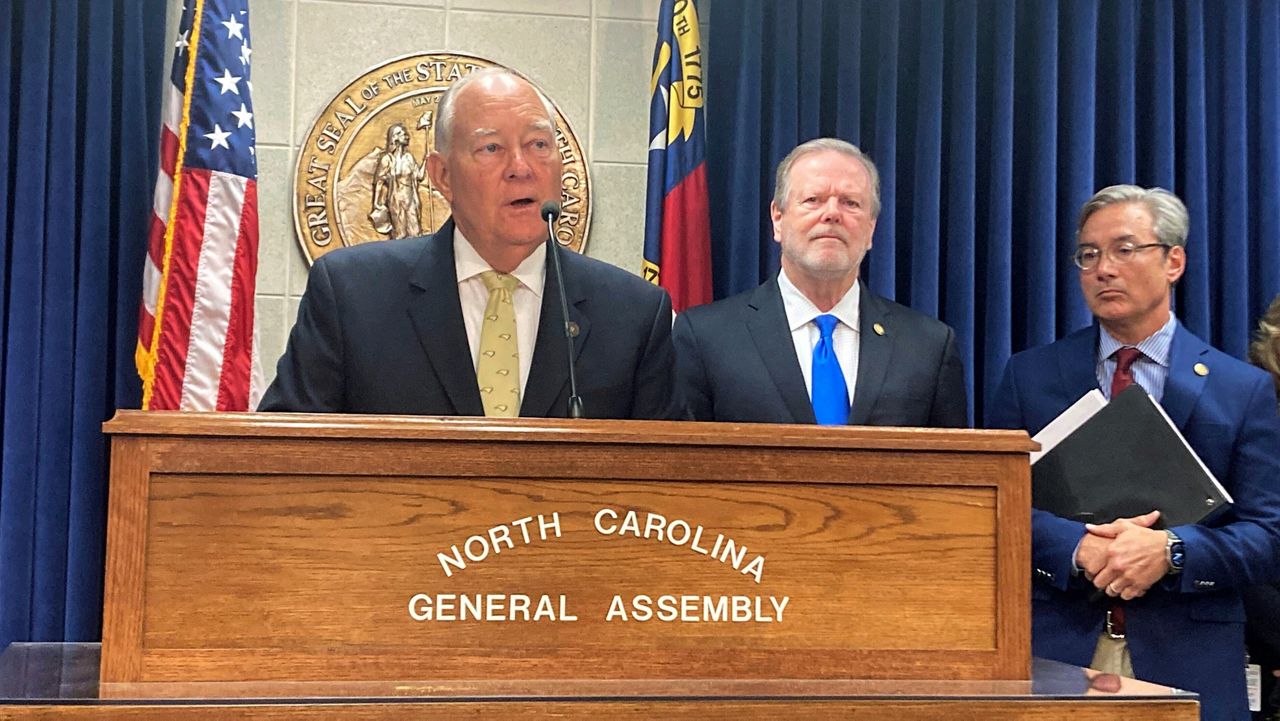 North Carolina state Sen. Brent Jackson, R-Sampson, left, speaks at a Legislative Building news conference while Senate leader Phil Berger, R-Rockingham, center, and Sen. Michael Lee, R-New Hanover, watch on Monday, May 15, 2023, in Raleigh, N.C. (AP photo/Gary D. Robertson)