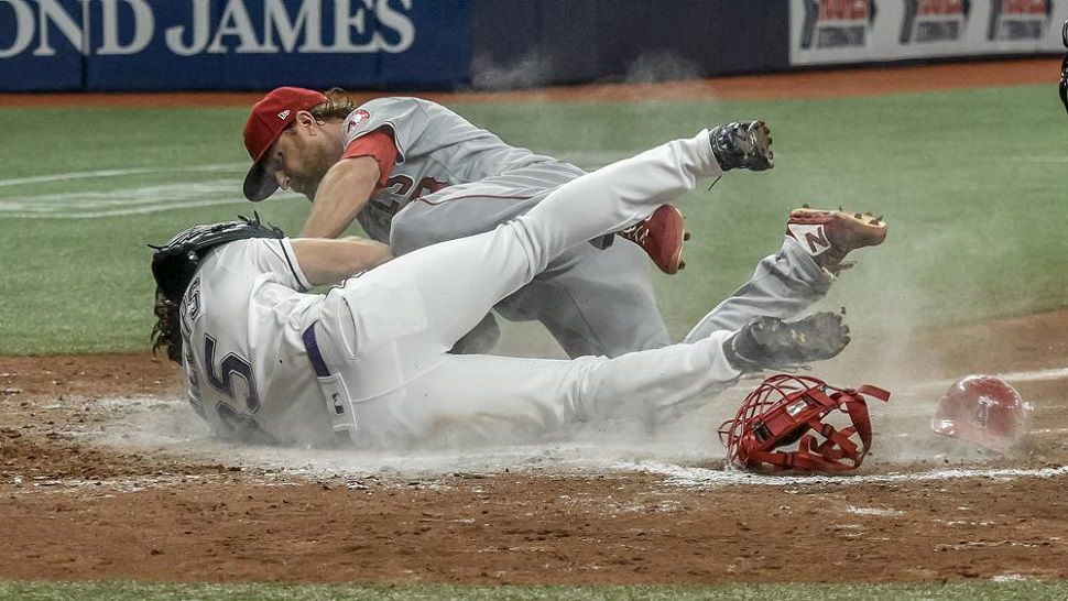 Rays' Brett Phillips pitches, and makes amazing catch