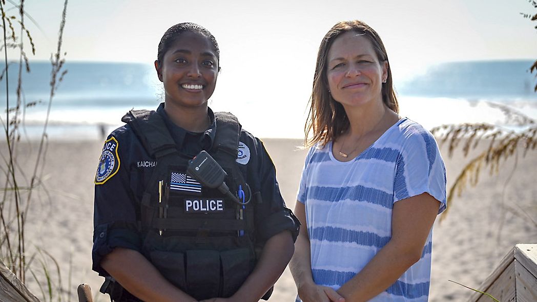Gretta Lowry (right) credits Officer Christy Kalicharan with saving her life after a June shark attack near Patrick Space Force Base. (SLD 45 A1C Tom Sjoberg)