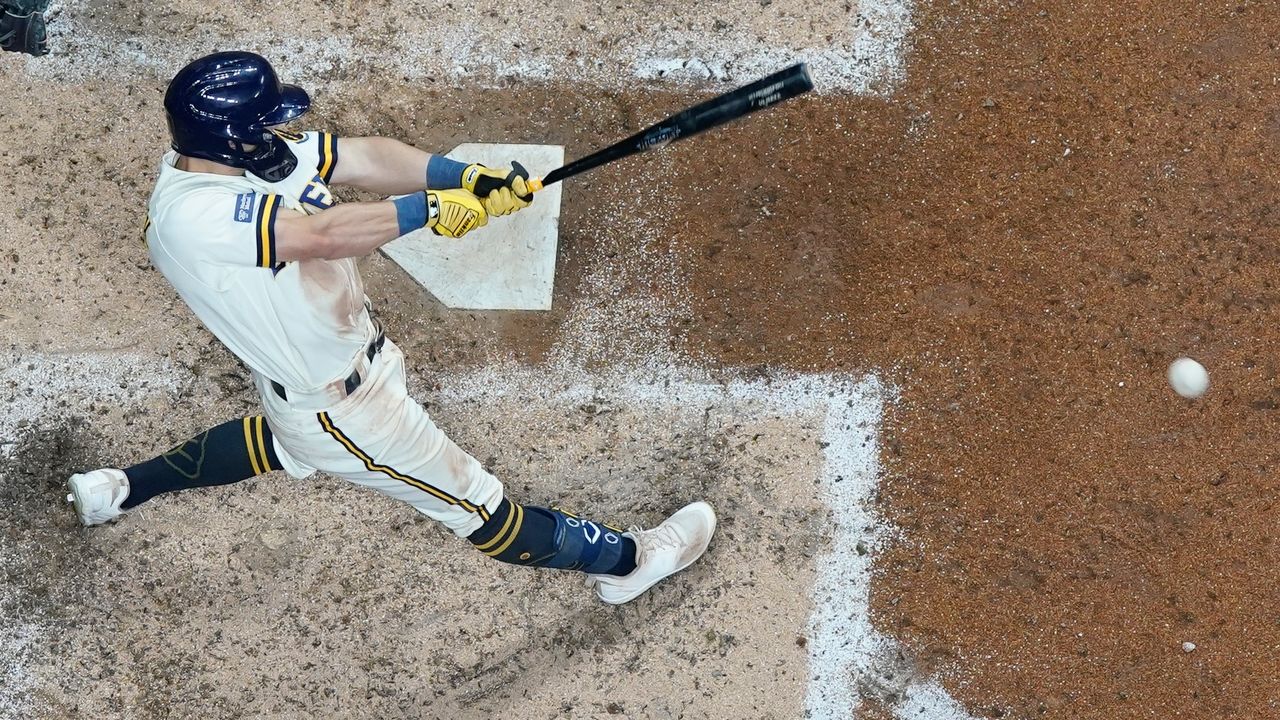 Milwaukee Brewers' Sal Frelick hits a single during the fifth inning of a Game 1 of their National League wildcard baseball series against the Arizona Diamondbacks 