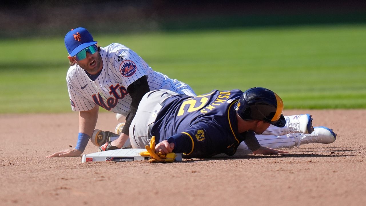 McNeil and Hoskins get heated after hard slide in Brewers-Mets opener