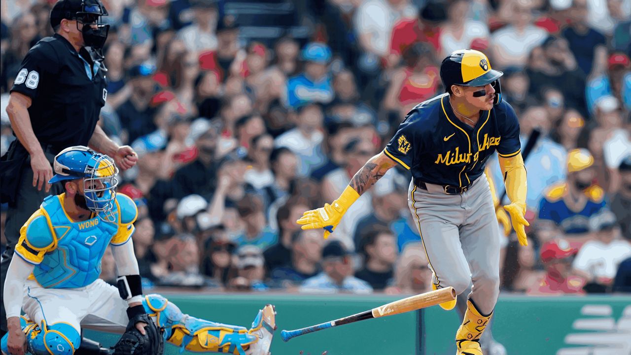 Milwaukee Brewers' Joey Ortiz runs on his two-run double in front of Boston Red Sox catcher Connor Wong 