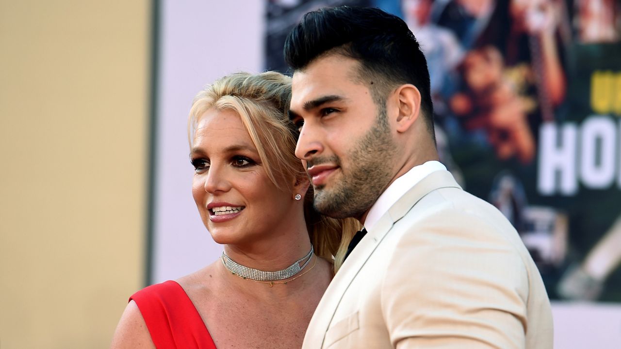 Britney Spears and Sam Asghari arrive at the Los Angeles premiere of "Once Upon a Time in Hollywood," at the TCL Chinese Theatre, July 22, 2019. (Photo by Jordan Strauss/Invision/AP)