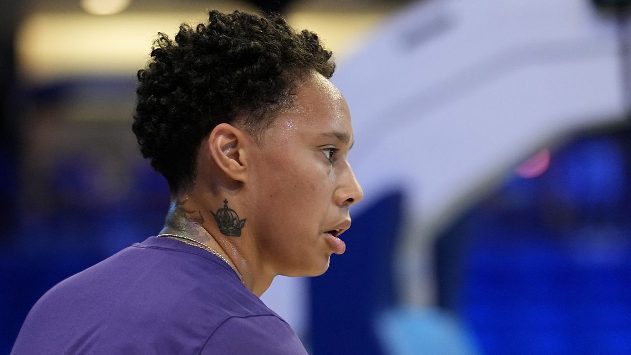 Phoenix Mercury's Brittney Griner prepares for the team's WNBA basketball game against the Dallas Wings, Wednesday, June 7, 2023, in Arlington, Texas. (AP Photo/Tony Gutierrez)