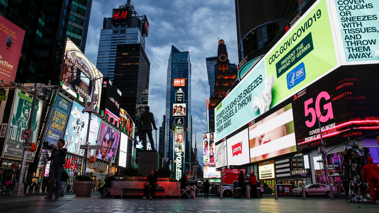 A largely empty Times Square on March 20, 2020.  (AP Photo/John Minchillo, File)