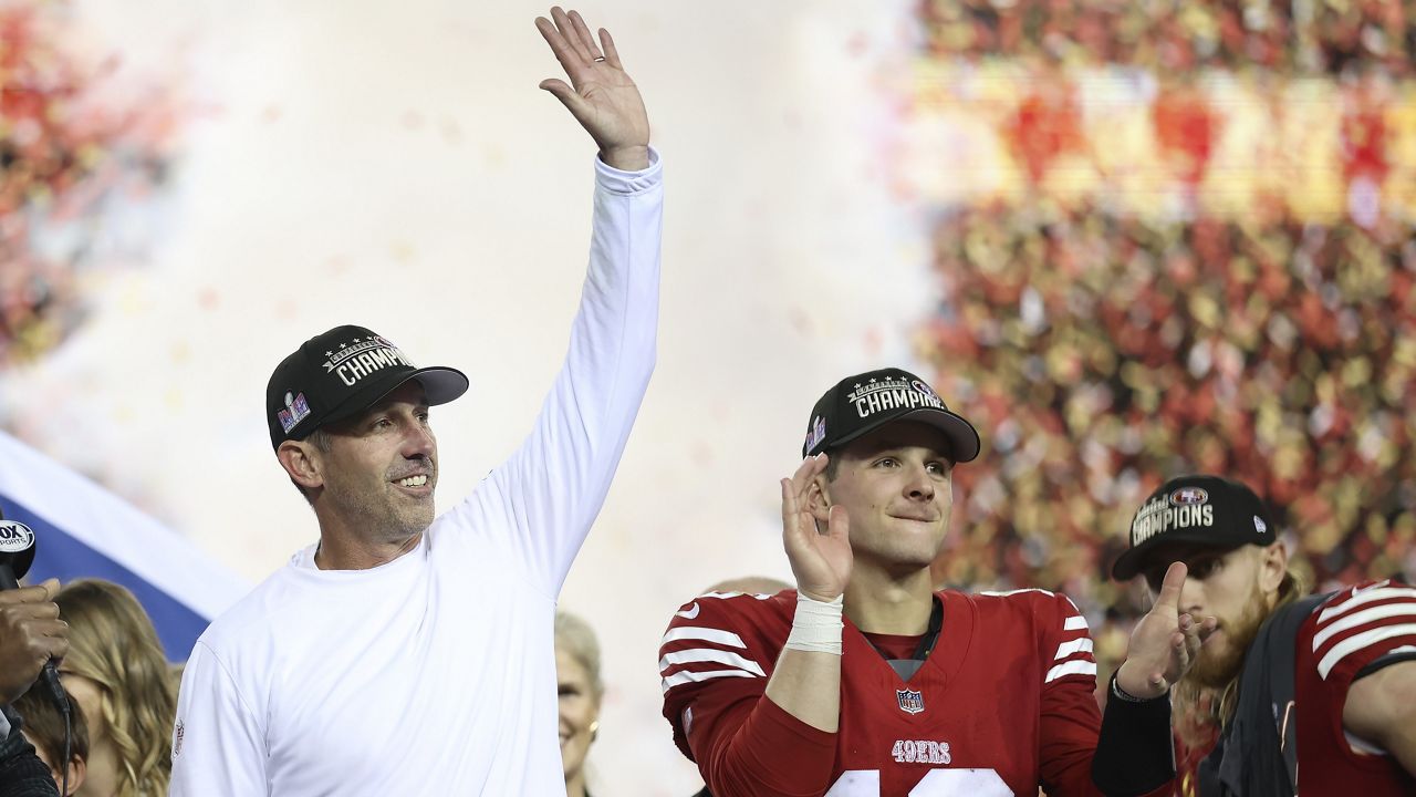 San Francisco 49ers head coach Kyle Shanahan, left, and quarterback Brock Purdy (13) celebrate after the NFC Championship NFL football game against the Detroit Lions in Santa Clara, Calif., Sunday, Jan. 28, 2024. (AP Photo/Jed Jacobsohn)