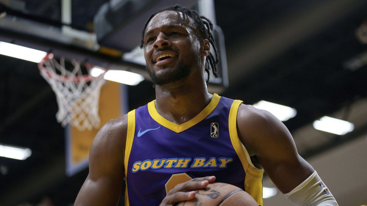 South Bay Lakers guard Bronny James holds the ball during the first half of an NBA G League basketball game against the Salt Lake City Stars, Saturday, Nov. 9, 2024, in El Segundo, Calif. (AP Photo/Eric Thayer)