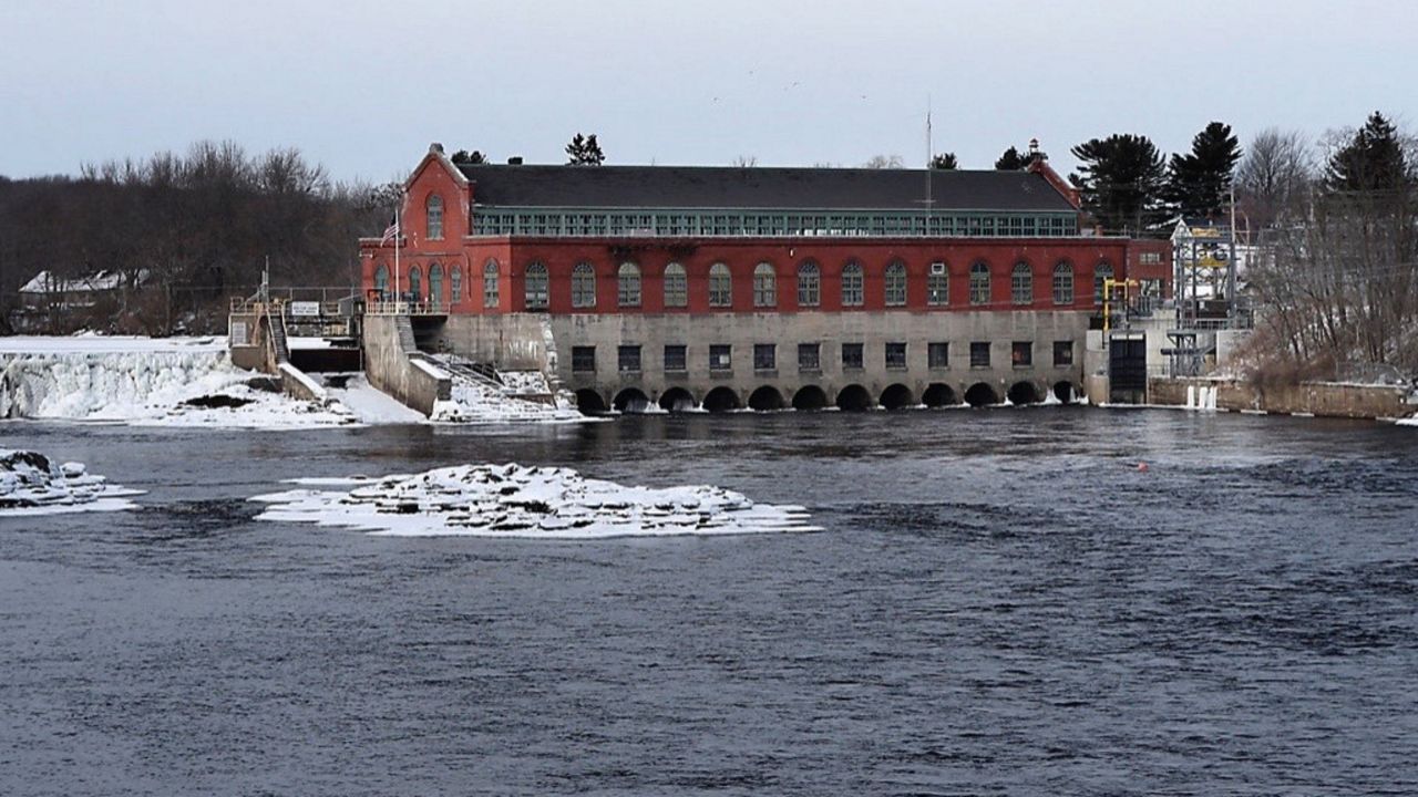 FILE- In this Jan. 19, 2019 file photo, the Brookfield Renewable hydroelectric facility stands at the Milford Dam on the Penobscot River in Milford, Maine. A group of environmental organizations and a Native American tribe charged Monday, March 6, 2023 that the operator of a Maine dam isn’t fulfilling its obligation to protect the last remaining river run Atlantic salmon in the country. (AP Photo/Robert F. Bukaty, file)
