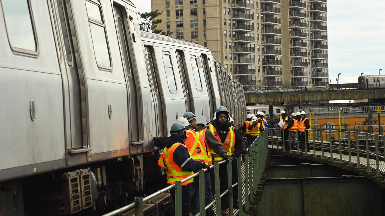 A Manhattan-bound F train derailed, with one of its wheels coming off the track, as it approached Neptune Avenue on Jan 10, 2024. (Marc A. Hermann/MTA)