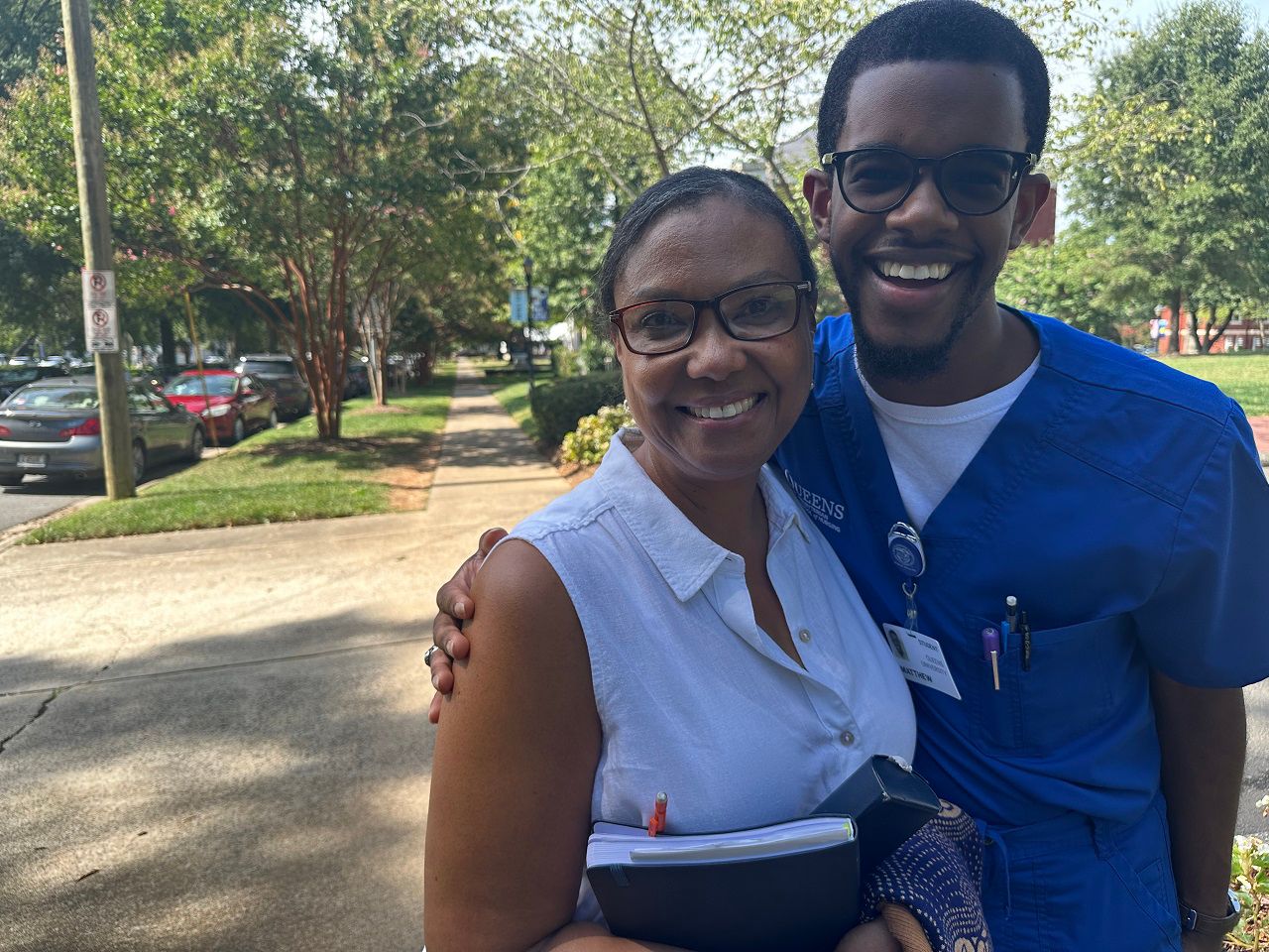 Queens University student Matthew Brown credits Dr. Yvette Clifton, a first-generation graduate and staff member at Queens, for helping him thrive on the campus. Brown, a senior, will soon be the first in his family to get a bachelor's degree. (Spectrum News 1/Jennifer Roberts)