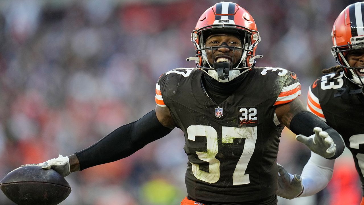 Cleveland Browns' D'Anthony Bell (37) celebrates after intercepting a pass from Chicago Bears quarterback Justin Fields to end an NFL football game, Sunday, Dec. 17, 2023, in Cleveland. (AP Photo/Sue Ogrocki)