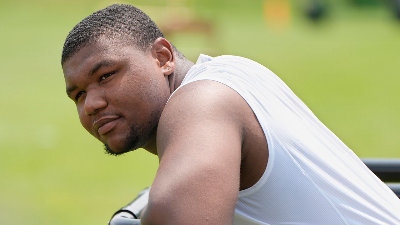 Cleveland Browns defensive tackle Mike Hall Jr. waits for his turn to speak at a news conference during an NFL football training camp practice Saturday, July 27, 2024, in White Sulphur Springs, W.Va. (AP Photo/Sue Ogrocki)