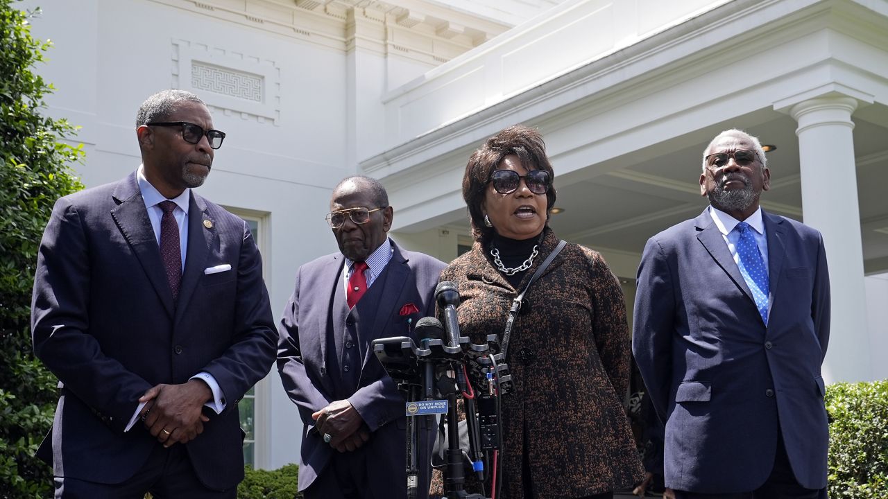 Cheryl Brown Henderson, second from right, daughter of Brown v. Board of Education plaintiff Oliver Brown, speaks to reporters outside the White House, Thursday, May 16, 2024, after meeting with President Joe Biden. Henderson is joined by, from left, NAACP President Derrick Johnson, Brown v. Board of Education plaintiff John Stokes, and Nathaniel Briggs, son of Brown v. Board of Education plaintiff Harry Briggs Jr. (AP Photo/Susan Walsh)