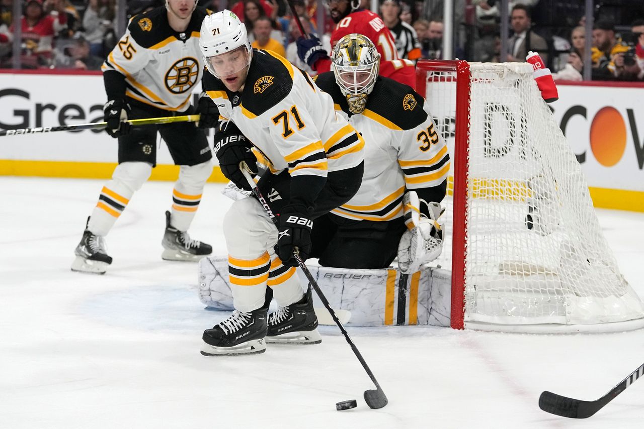 FILE - Boston Bruins left wing Taylor Hall (71) skates with the puck during the second period of Game 3 of an NHL hockey Stanley Cup first-round playoff series against the Florida Panthers, April 21, 2023, in Sunrise, Fla.  The Chicago Blackhawks acquired Hall in a trade with the Bruins, Monday, June 26, 2023, putting the veteran forward in line to play with the No. 1 overall pick in the NHL draft once again. (AP Photo/Lynne Sladky, File)