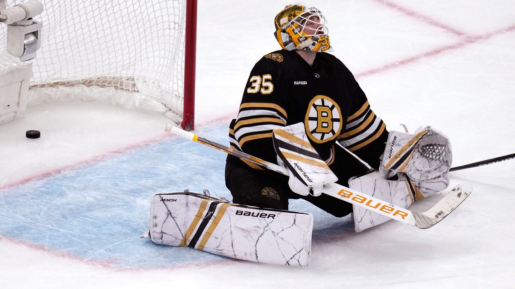 Boston Bruins goaltender Linus Ullmark reacts after giving up a tiebreaking goal to Carolina Hurricanes left wing Jordan Martinook during the third period of an NHL hockey game Wednesday, Jan. 24, 2024, in Boston. (AP Photo/Charles Krupa)