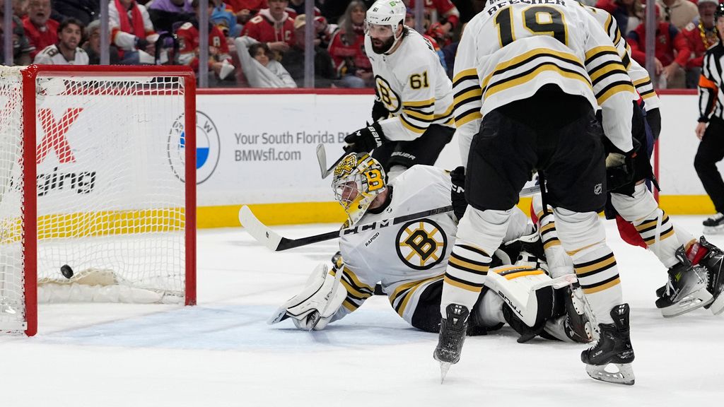 The puck gets past Boston Bruins goaltender Jeremy Swayman on a goal by Florida Panthers center Aleksander Barkov during the second period of Game 2 of a second-round series of the NHL hockey Stanley Cup playoffs Wednesday, May 8, 2024, in Sunrise, Fla. (AP Photo/Lynne Sladky)