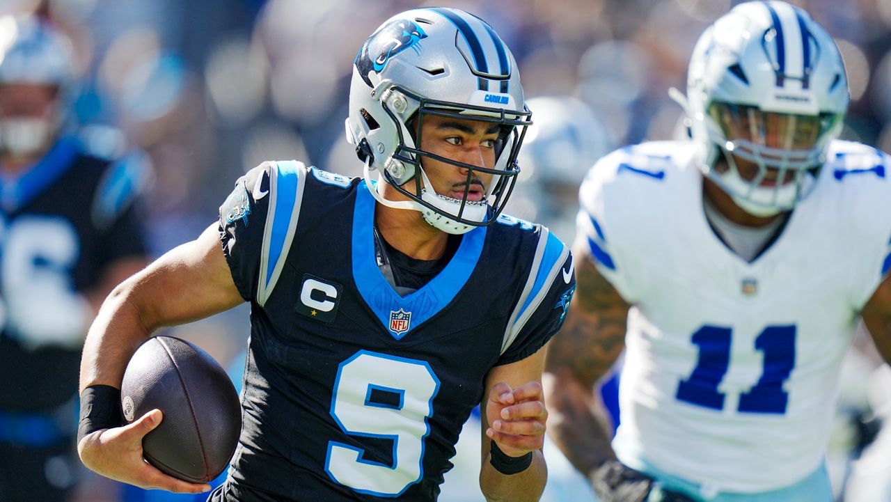 Carolina Panthers quarterback Bryce Young runs against the Dallas Cowboys during an NFL football game Sunday, Nov. 19, 2023, in Charlotte, N.C. (AP Photo/Rusty Jones)