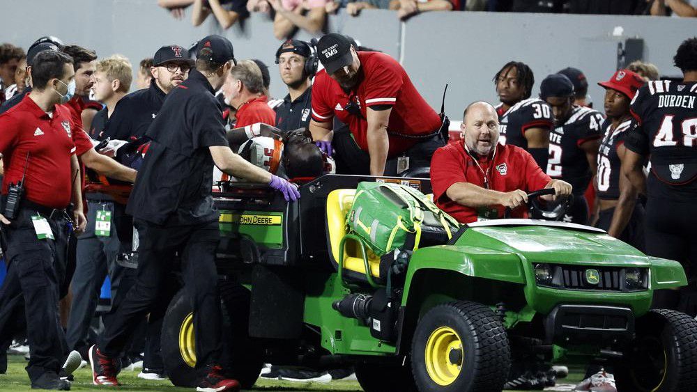 Texas Tech's Bryce Ramirez (54) is carted off the field by medical staff following suffering an unknown injury to his left leg during the first half of an NCAA college football game against North Carolina State in Raleigh, N.C., Saturday, Sept. 17, 2022. (AP Photo/Karl B DeBlaker)