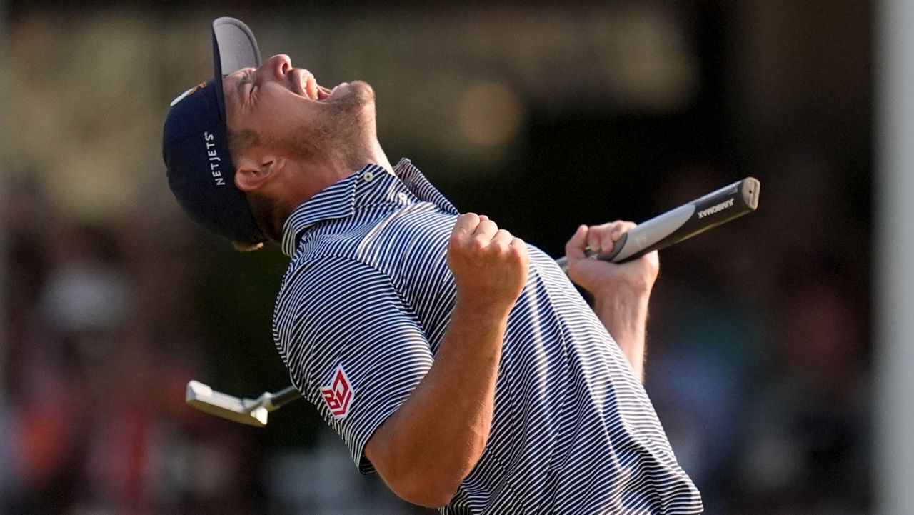 Bryson DeChambeau celebrates after winning the U.S. Open golf tournament Sunday, June 16, 2024, in Pinehurst, N.C. (AP Photo/Mike Stewart)