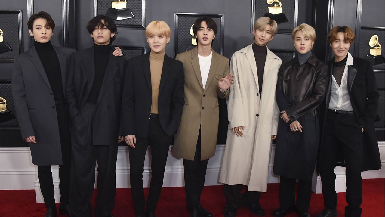 K-pop band BTS arrives for the 62nd annual Grammy Awards in Los Angeles on Jan. 26, 2020. (Photo by Jordan Strauss/Invision/AP, File)