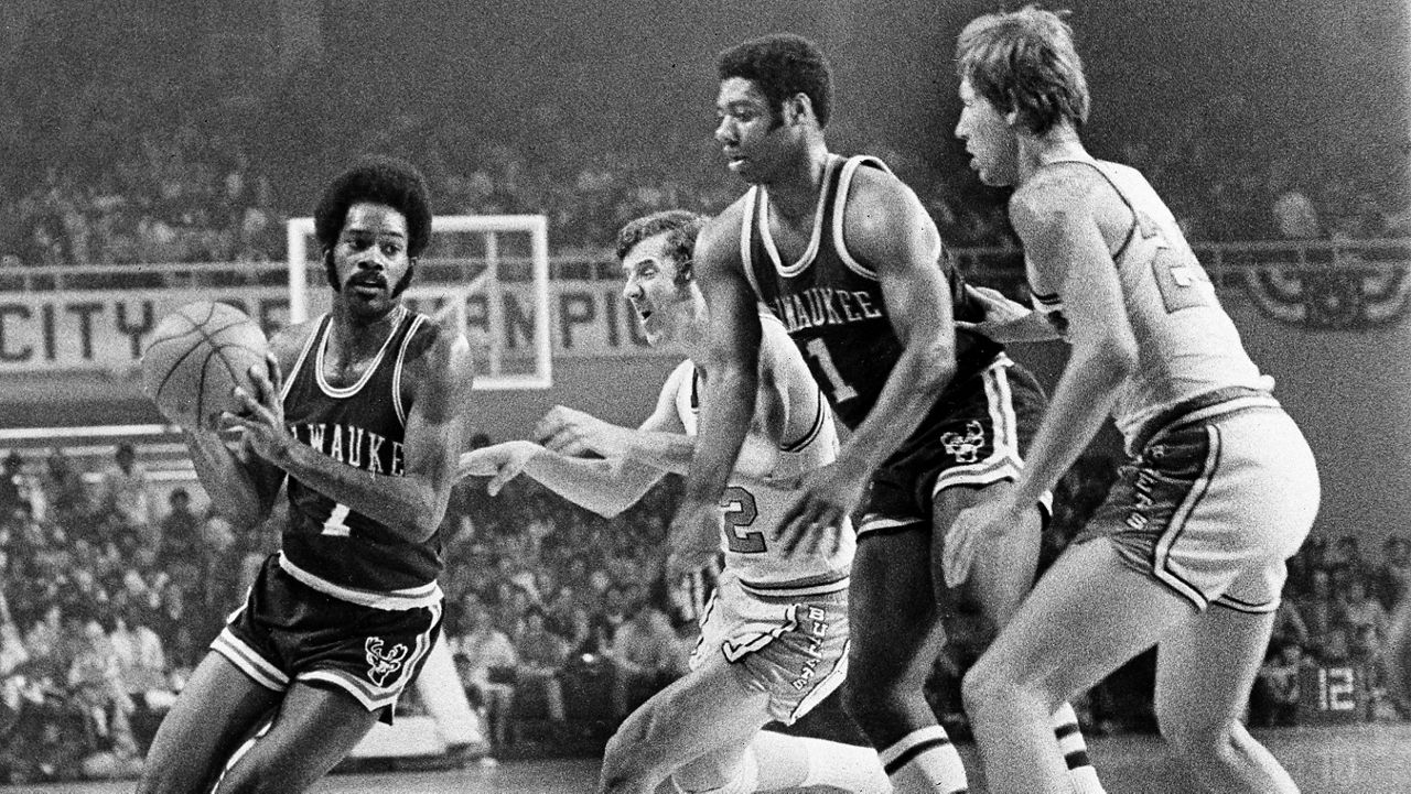 Oscar Robertson of the Milwaukee Buckds stands with his family at News  Photo - Getty Images