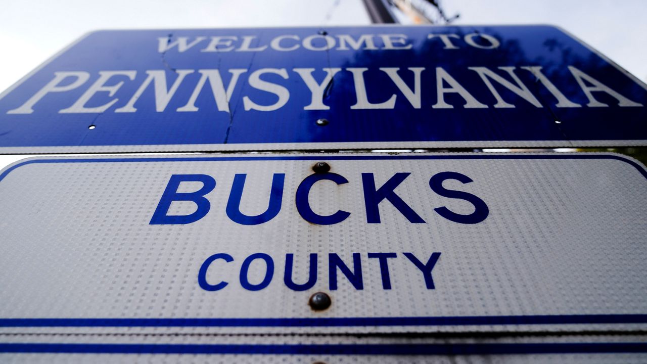  A sign is posted in New Hope, Pa., upon entering Bucks County from New Jersey, Thursday, Nov. 4, 2021.  (AP Photo/Matt Rourke)