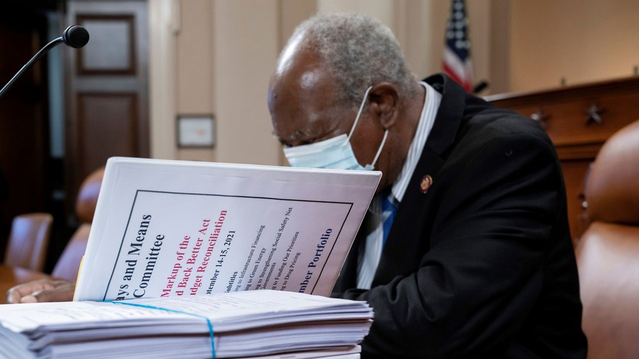 In this Sept. 14, 2021, file photo Rep. Danny Davis, D-Ill., looks over documents as the tax-writing House Ways and Means Committee continues working on a proposal for tax hikes on big corporations and the wealthy to fund President Joe Biden's $3.5 trillion domestic rebuilding plan, at the Capitol in Washington.. (AP Photo/J. Scott Applewhite)