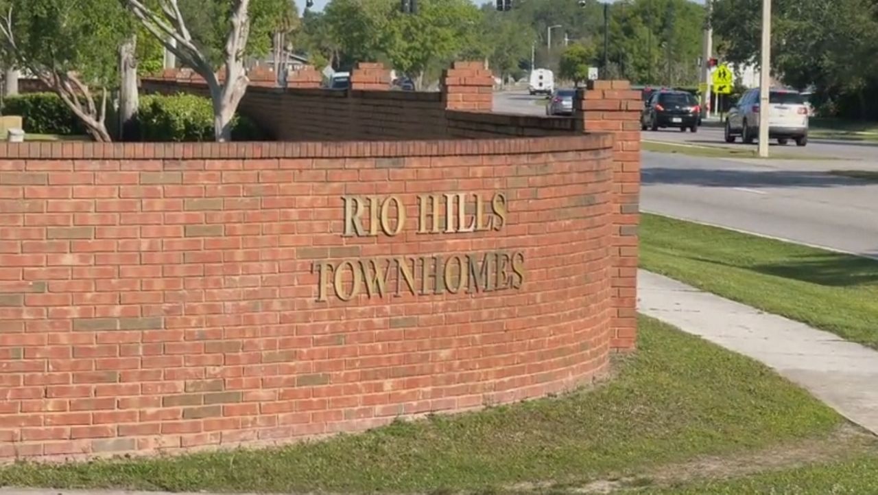 Joey Velazquez says a wall blocks oncoming traffic when turning from Oakwood Dr onto Buenaventura Blvd. (Jesse Walden, Spectrum News)