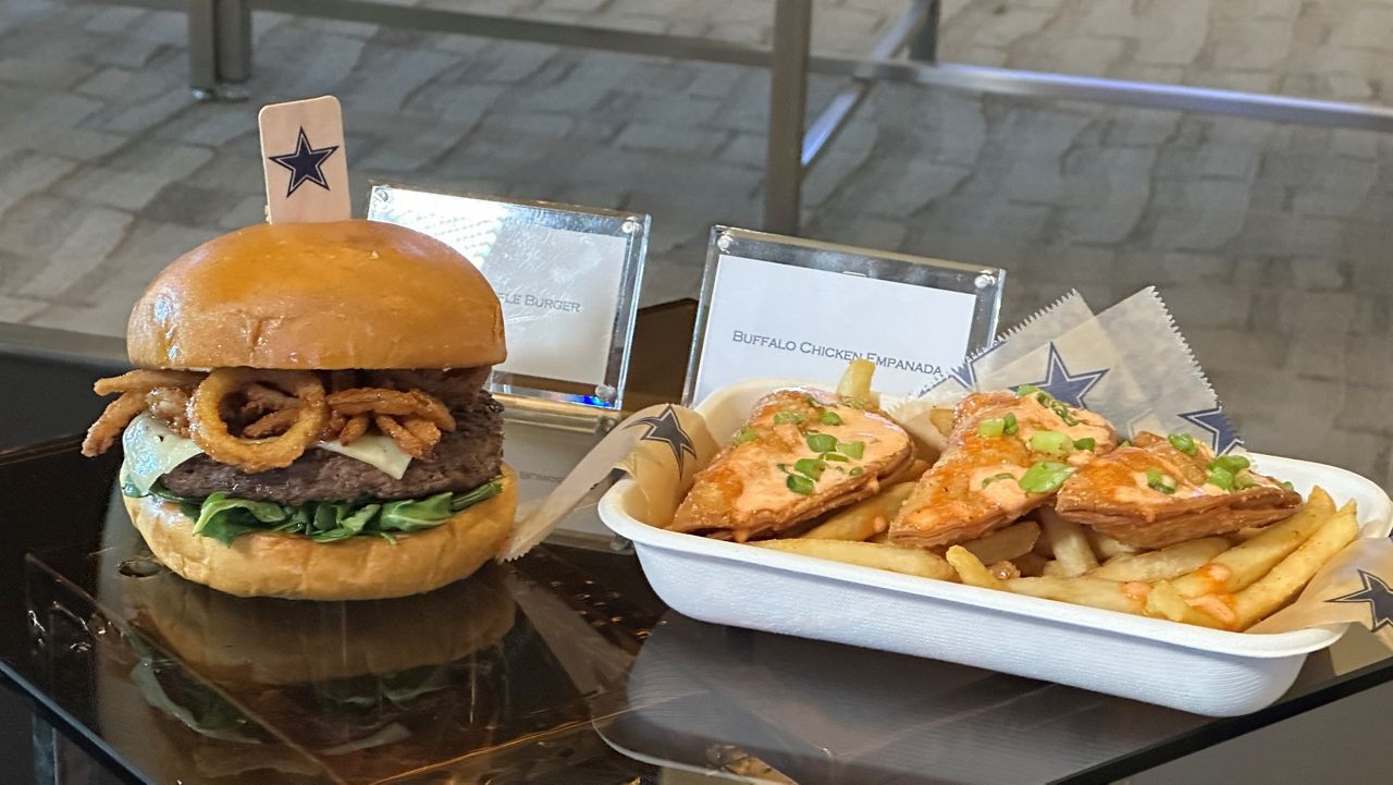 The Wagyu Truffle Burger and the Buffalo Chicken Empanadas at AT&T Stadium. (Spectrum News 1/Alana Canady)