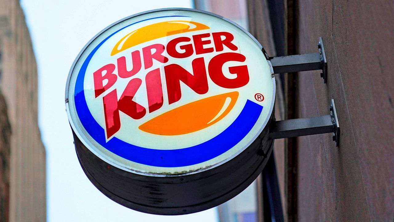 The Burger King logo is seen on a sign outside a downtown Pittsburgh location. (AP Photo/Gene J. Puskar, File)