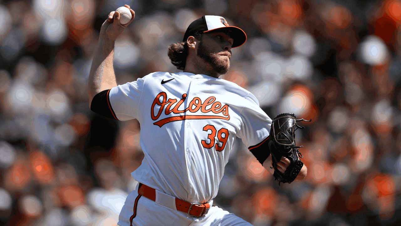 Baltimore Orioles pitcher Corbin Burnes throws during the first inning of a baseball game