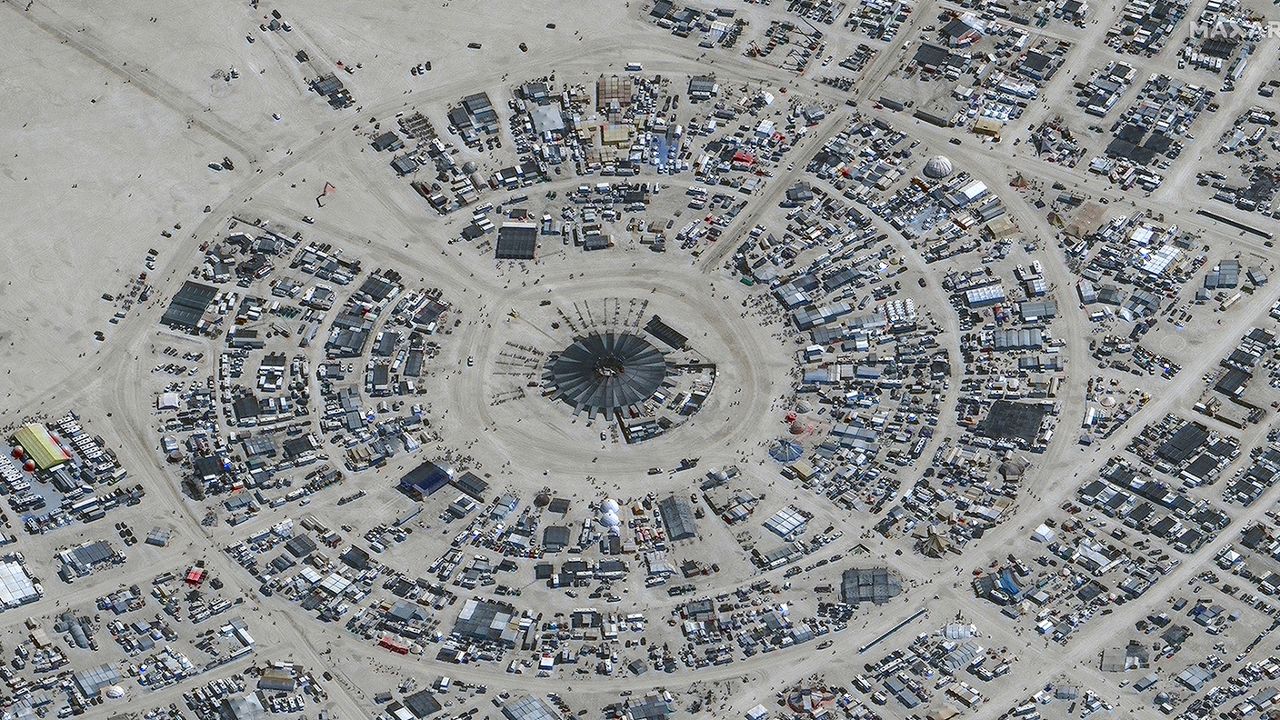 In this satellite photo provided by Maxar Technologies, an overview of Burning Man festival in Black Rock is seen on Monday, Aug. 28, 2023.