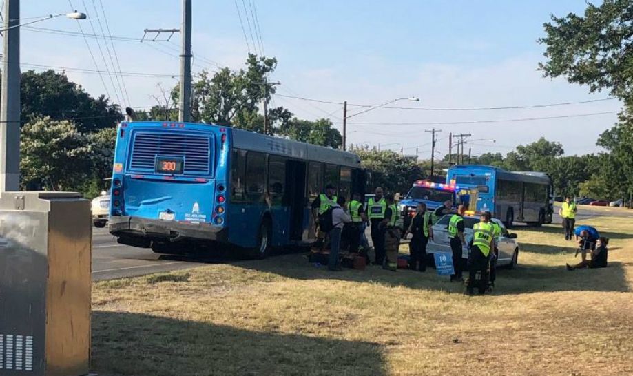 EMS workers attend to people injured in a bus collision involving Capital Metro buses in Austin, Texas, in this image from July 27, 2018. (Source: @ATCEMS)